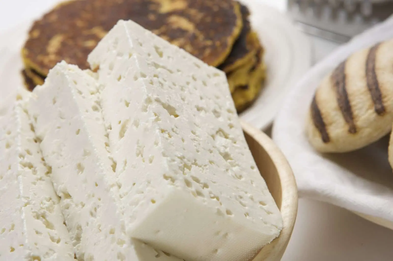queso deutsch - Was heißt Queso übersetzt